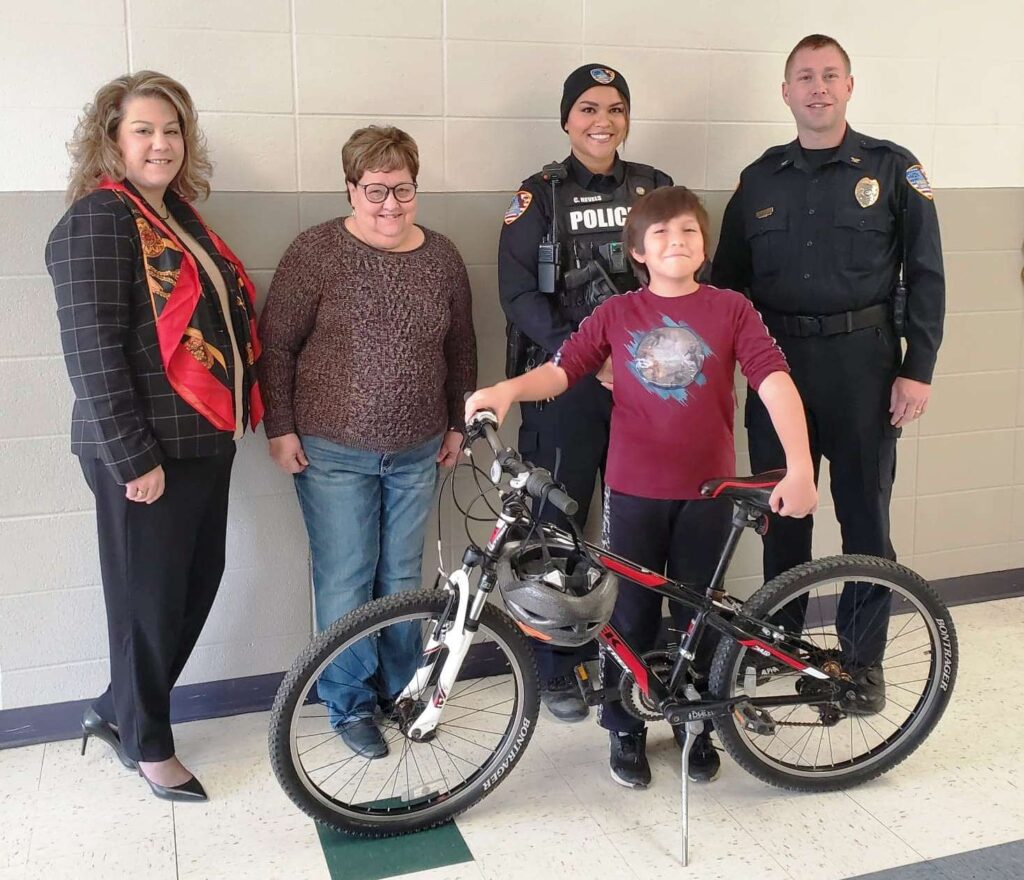 Richmond City Manager, School Resource Officer and Chief of Police bike presentation